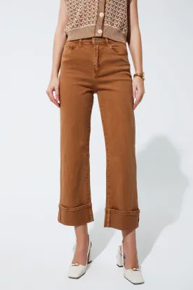 Straight leg jeans in camel with folded trouser legs